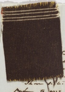 A small dark swatch of cloth