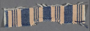 A small swatch of striped blue and white cloth